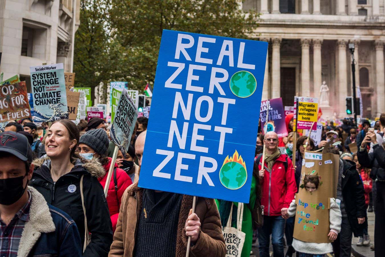 2H57CRH Real zero no net zero placard, Global Day of Action for Climate Justice demonstration, London, UK. 6th November 2021